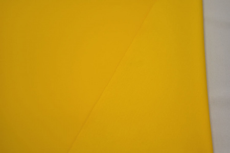 Курточная винил желтая ткань W-131544