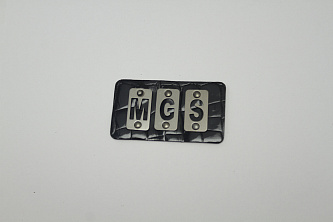 Нашивка патч черного цвета с надписью MGS W-133286