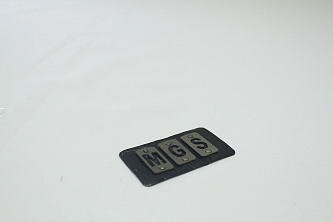 Нашивка патч черного цвета с надписью MGS W-133286