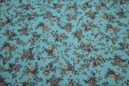 Сетка-стрейч голубая цветы W-128574